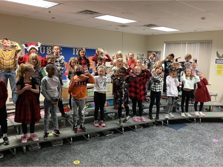 2nd grade showing their ‘silly faces’ for the Holiday program. 
