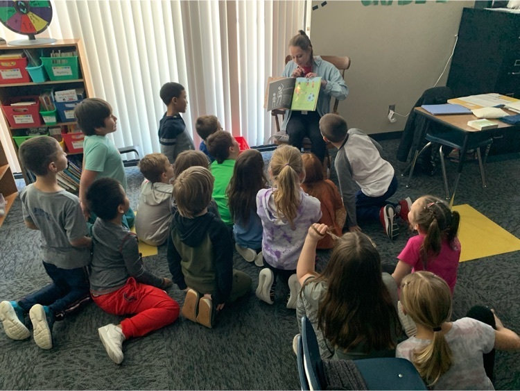 Students listening to reader.