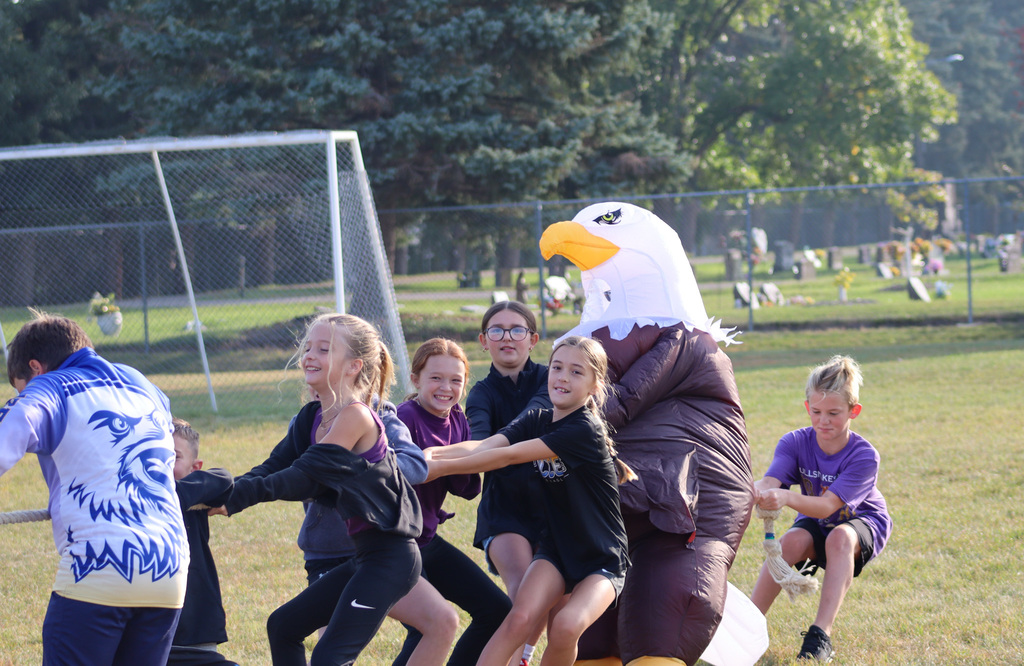 C.C. Lee students and the Eagle play tug of war