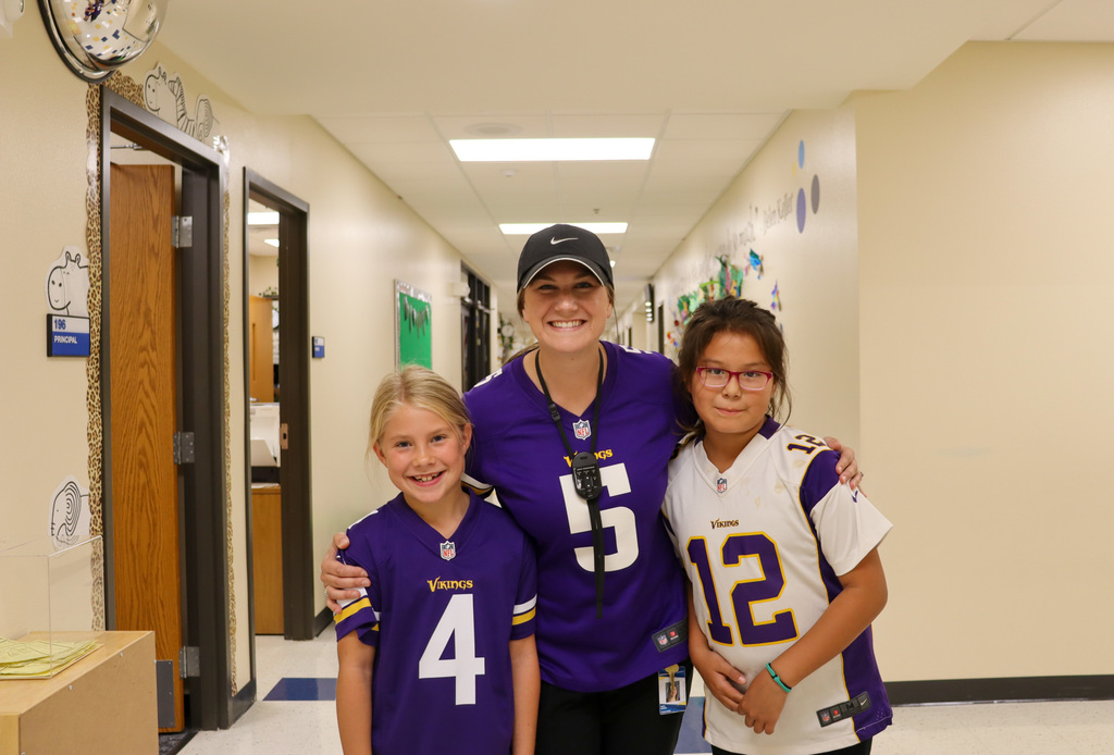 Mike Miller Elementary teacher and students dressed in Vikings gear on Jersey and Hat Day